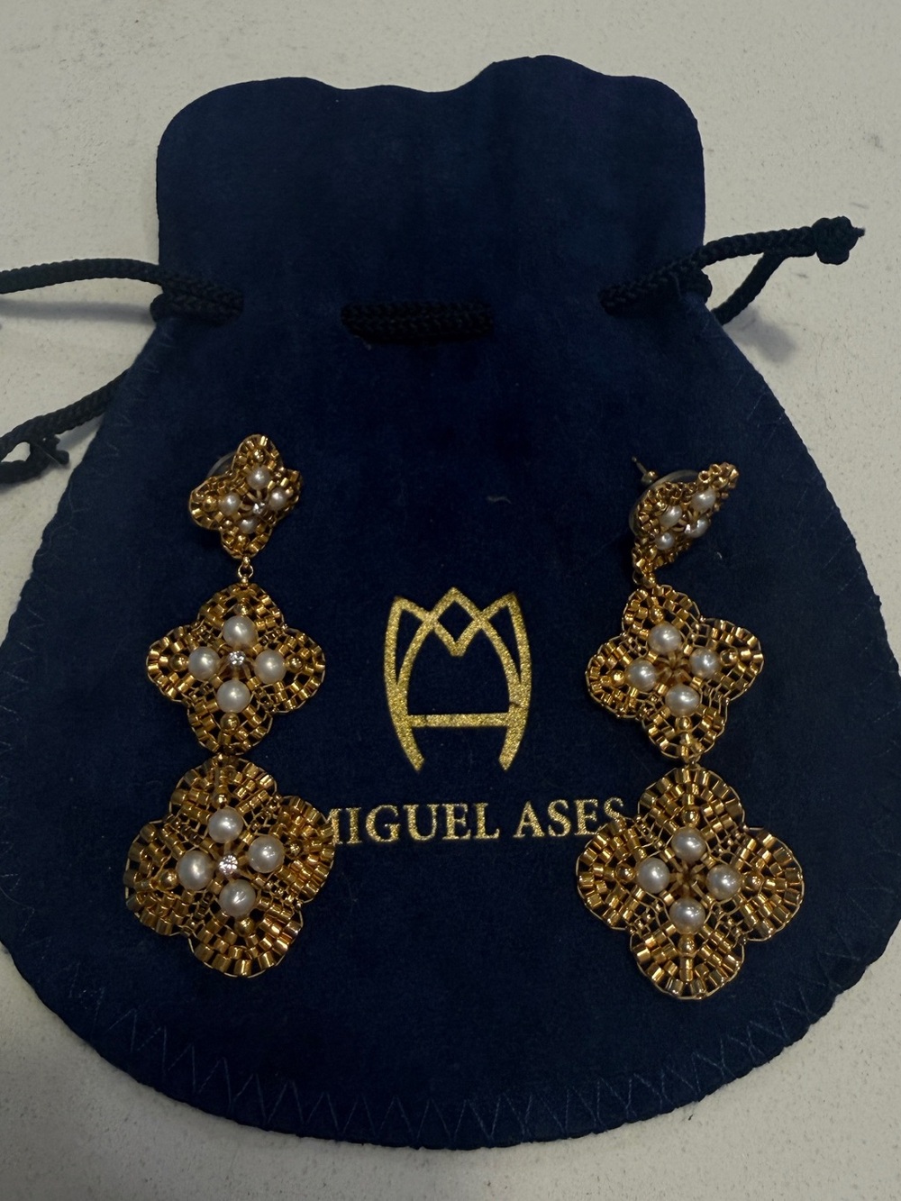 Miguel Ases White and Gold Hanging Earrings
